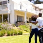 Couple looking at new sunscreens for their new home.